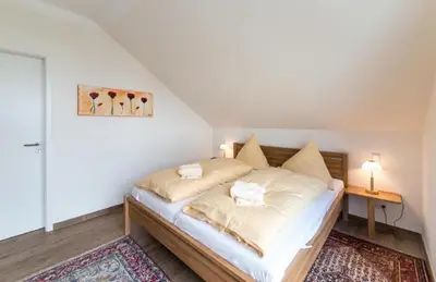 Ein Bett oder Betten in einem Zimmer der Unterkunft Nordico 10