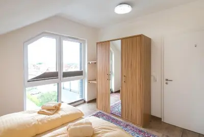 Ein Bett oder Betten in einem Zimmer der Unterkunft Nordico 10