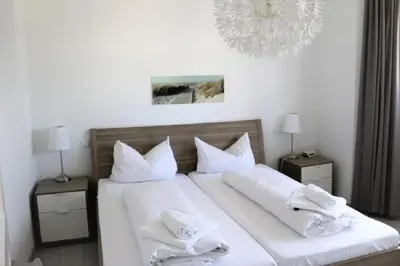 Ein Bett oder Betten in einem Zimmer der Unterkunft Nordsee 04