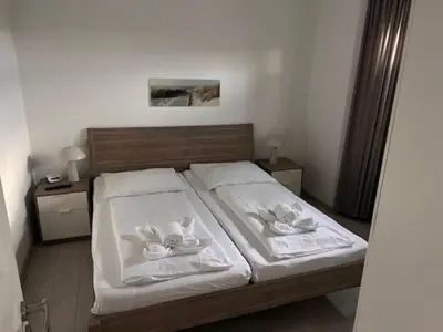 Ein Bett oder Betten in einem Zimmer der Unterkunft Nordsee 03