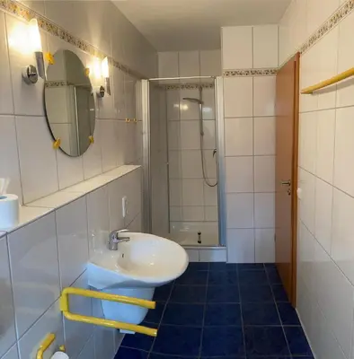 Ein Badezimmer in der Unterkunft Rugenbargsweg 12