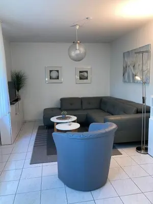 Ein Sitzbereich in der Unterkunft Voßhörn 27 Whg. 1
