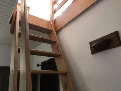 Ein Etagenbett oder Etagenbetten in einem Zimmer der Unterkunft Voßhörn 09