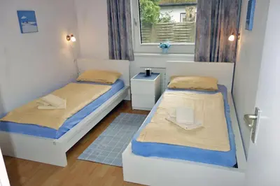Ein Bett oder Betten in einem Zimmer der Unterkunft Voßhörn 27 Whg. 3