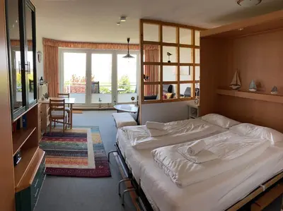 Ein Bett oder Betten in einem Zimmer der Unterkunft Residenz 18