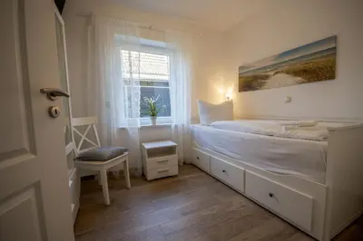 Ein Bett oder Betten in einem Zimmer der Unterkunft Cuxhavener Straße 5/1
