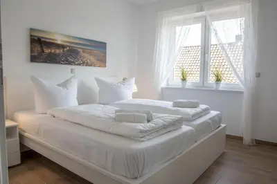 Ein Bett oder Betten in einem Zimmer der Unterkunft Cuxhavener Straße 5/3