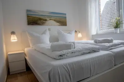 Ein Bett oder Betten in einem Zimmer der Unterkunft Cuxhavener Straße 5/4