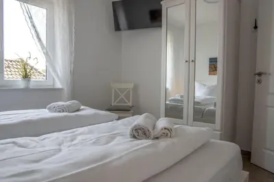 Ein Bett oder Betten in einem Zimmer der Unterkunft Cuxhavener Straße 5/4
