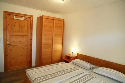 Ein Bett oder Betten in einem Zimmer der Unterkunft Ferienwohnung MeinFriKo