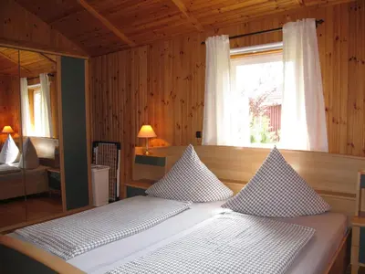 Ein Bett oder Betten in einem Zimmer der Unterkunft Chalet Martin by Interhome