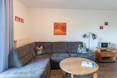 Ein Sitzbereich in der Unterkunft Haus Stranddüne Wohnung 17