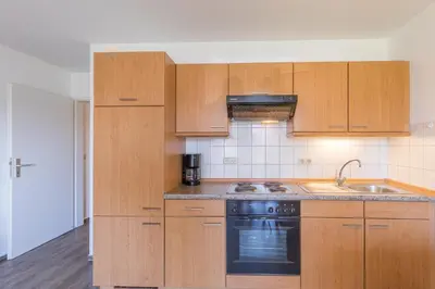 Küche/Küchenzeile in der Unterkunft Haus Stranddüne Wohnung 17