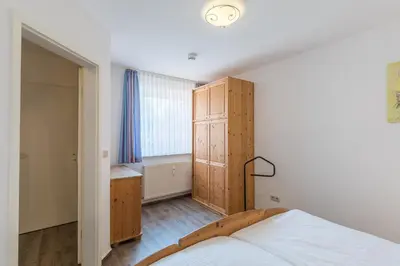 Ein Bett oder Betten in einem Zimmer der Unterkunft Haus Stranddüne Wohnung 17