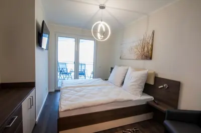 Ein Bett oder Betten in einem Zimmer der Unterkunft Döser Seedeich 7