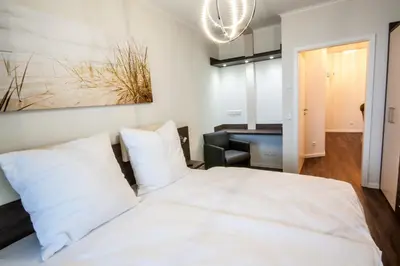 Ein Bett oder Betten in einem Zimmer der Unterkunft Döser Seedeich 7