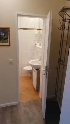 Ein Badezimmer in der Unterkunft Küstenoase