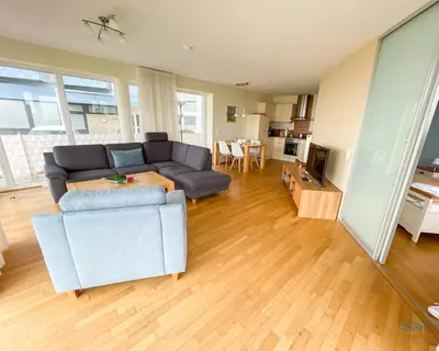 Ein Sitzbereich in der Unterkunft Haus Blue Ocean Wohnung 8