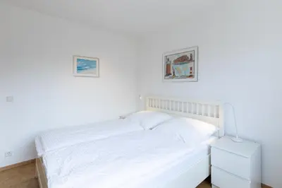 Ein Bett oder Betten in einem Zimmer der Unterkunft Wohnung 27