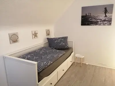 Ein Bett oder Betten in einem Zimmer der Unterkunft Steinmarner Bude