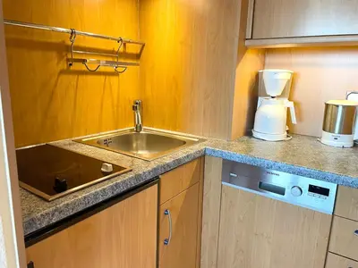 Küche/Küchenzeile in der Unterkunft Strandhochhaus J12