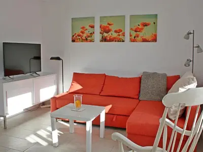 Ein Sitzbereich in der Unterkunft Ferienhaus Domizil Wattenmeer