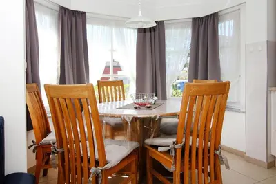 Ein Sitzbereich in der Unterkunft Terraced house, Friedrichkoog-Spitze