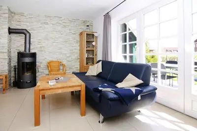 Ein Sitzbereich in der Unterkunft Terraced house, Friedrichkoog-Spitze
