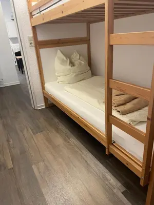 Ein Bett oder Betten in einem Zimmer der Unterkunft Strandhaus am Kurpark