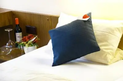 Ein Bett oder Betten in einem Zimmer der Unterkunft MarC5 Hotel Cadenberge