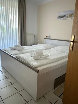 Ein Bett oder Betten in einem Zimmer der Unterkunft Oasis 01