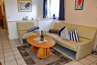Ein Sitzbereich in der Unterkunft Oasis 01