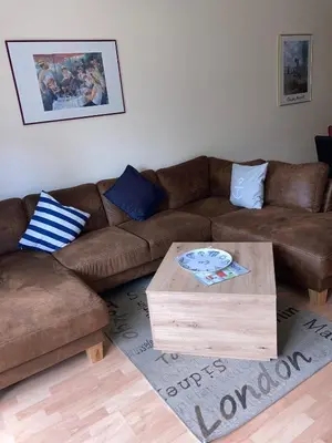 Ein Sitzbereich in der Unterkunft Oasis 03