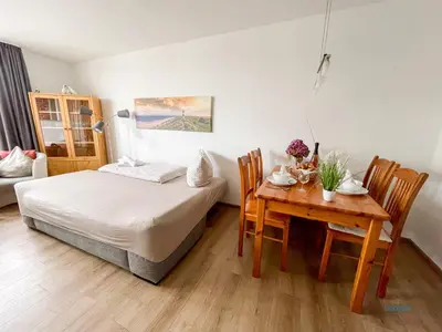 Ein Bett oder Betten in einem Zimmer der Unterkunft Residenz Hohe Worth Wohnung 307