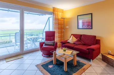 Ein Sitzbereich in der Unterkunft Duhner Seedüne Wohnung 7