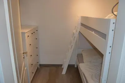 Ein Bett oder Betten in einem Zimmer der Unterkunft Ferienwohnung Meerglück