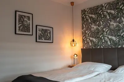 Ein Bett oder Betten in einem Zimmer der Unterkunft Apartment Enjoy