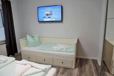 Ein Bett oder Betten in einem Zimmer der Unterkunft Zyrus 03