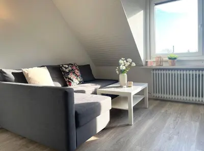 Ein Sitzbereich in der Unterkunft Ferienwohnung 'Haus Ingeborg, Wohnung 2/OG'