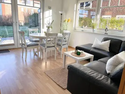 Ein Sitzbereich in der Unterkunft Ferienhaus 'Haus Eversand'