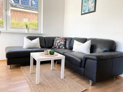 Ein Sitzbereich in der Unterkunft Ferienhaus 'Haus Eversand'