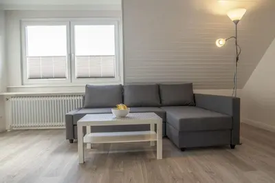 Ein Sitzbereich in der Unterkunft Ferienwohnung 'Haus Ingeborg, Wohnung 3/OG'
