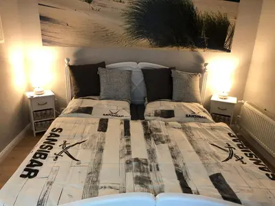 Ein Bett oder Betten in einem Zimmer der Unterkunft Lieblingsplatz - Ferienwohnung Verse