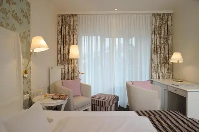Ein Bett oder Betten in einem Zimmer der Unterkunft Ringhotel Gardels