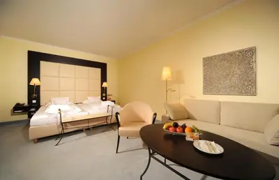 Ein Bett oder Betten in einem Zimmer der Unterkunft Ringhotel Gardels