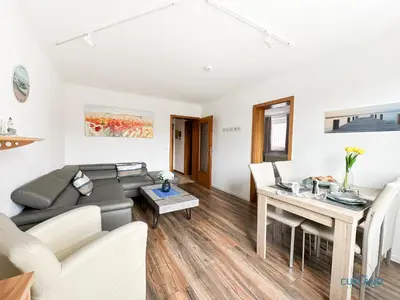 Ein Sitzbereich in der Unterkunft Auszeit im Haus Elbe Whg.6 in mitten von Döse, 800m bis zum Strand