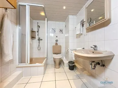 Ein Badezimmer in der Unterkunft Gemütliche Souterrain Wohnung in zentraler Lage von Duhnen