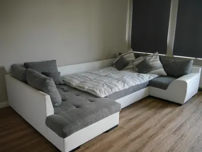 Ein Bett oder Betten in einem Zimmer der Unterkunft Ferienwohnung Zwischen Marsch u. Geest