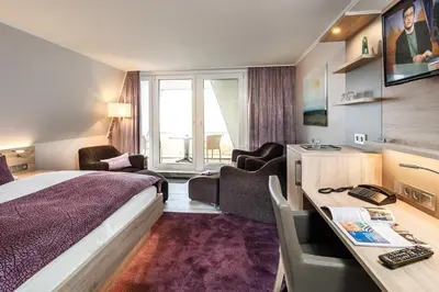 Ein Bett oder Betten in einem Zimmer der Unterkunft Wattenkieker