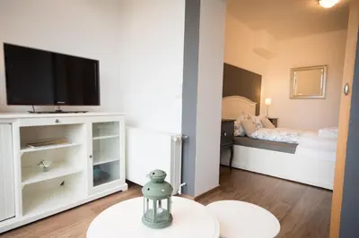 Ein Bett oder Betten in einem Zimmer der Unterkunft Hotel Nige Hus
